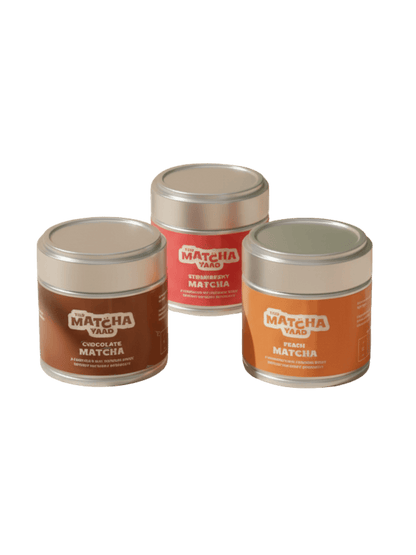 Flavoured Matcha Trio featuring Chocolate, Strawberry, and Peach Matcha in labeled tins. Perfect for tea lovers and latte enthusiasts.