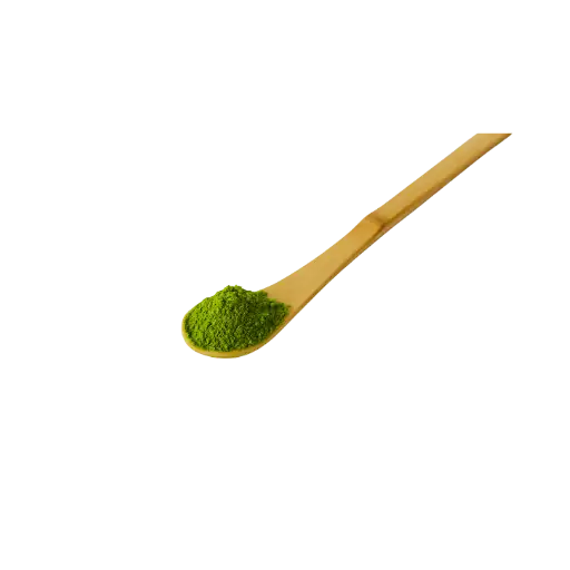 A light brown wooden spoon holds a mound of vibrant green matcha powder.