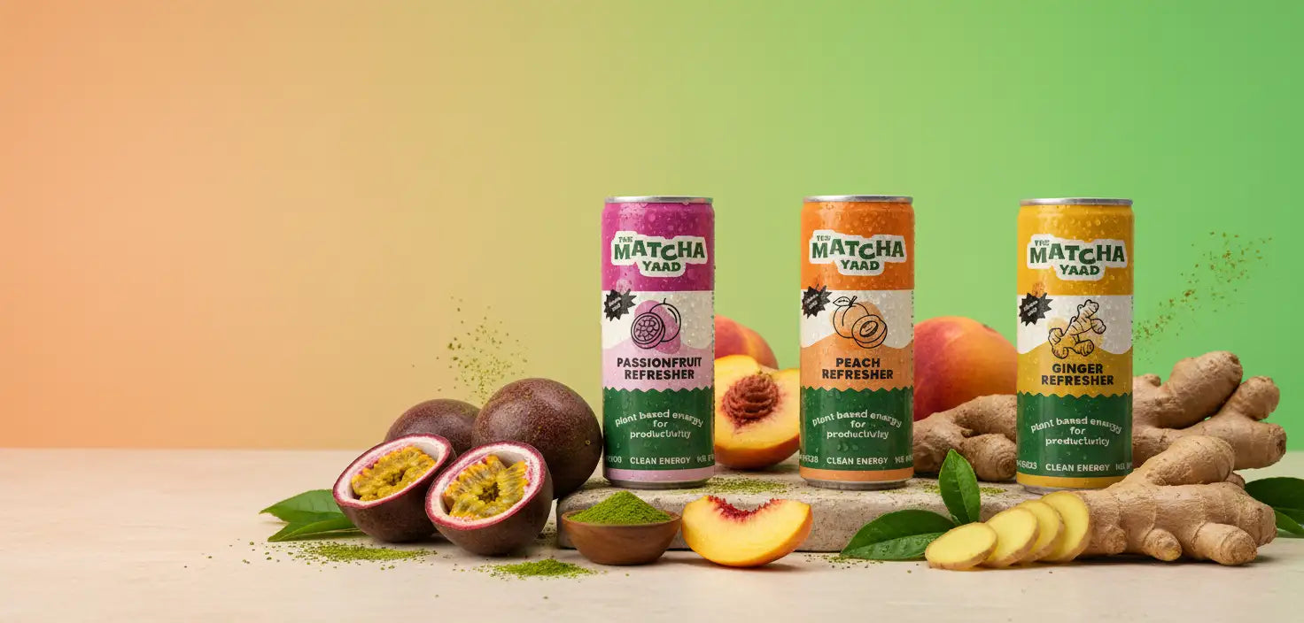 Three cylindrical matcha yard energy drink cans, each with a distinct flavor label and vibrant color scheme, pink for passionfruit, orange for peach, and yellow for ginger, with matching fruit garnishes around them.